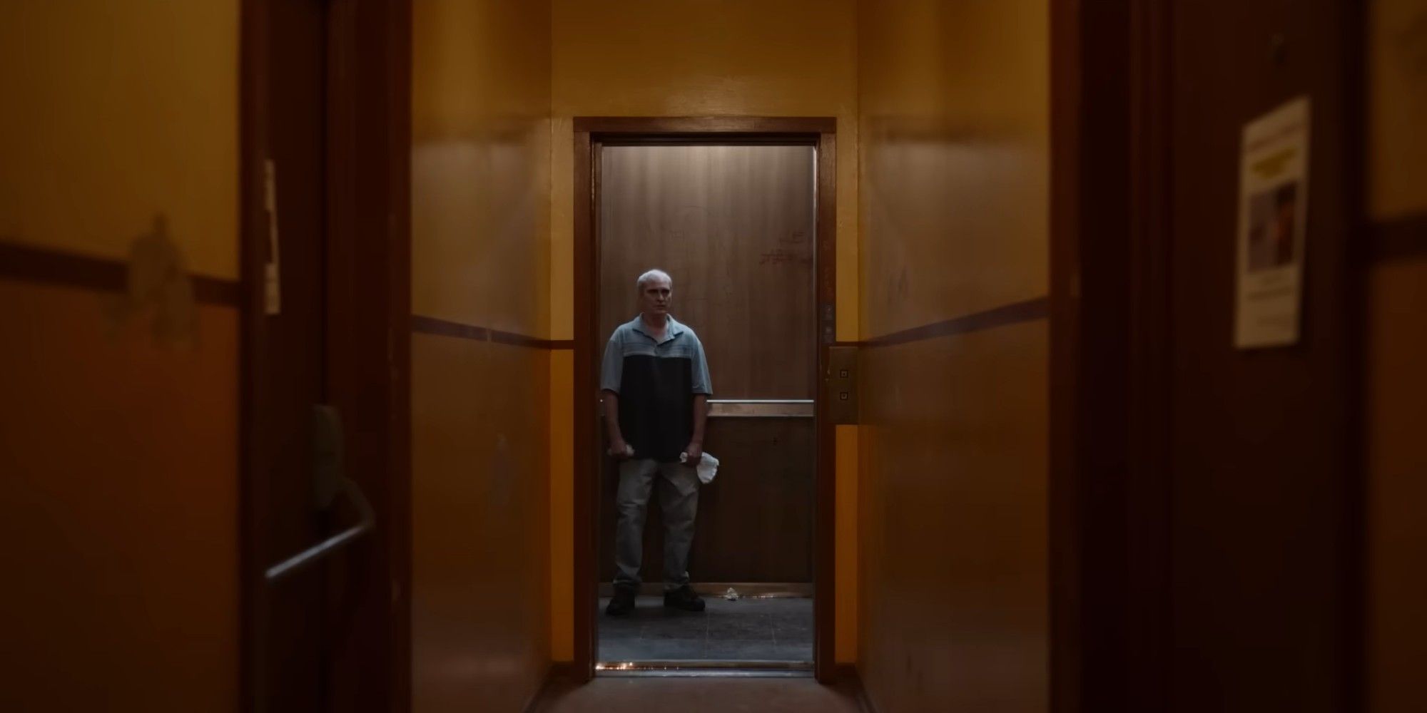 Joaquin Phoenix on an elevator in Beau is Afraid