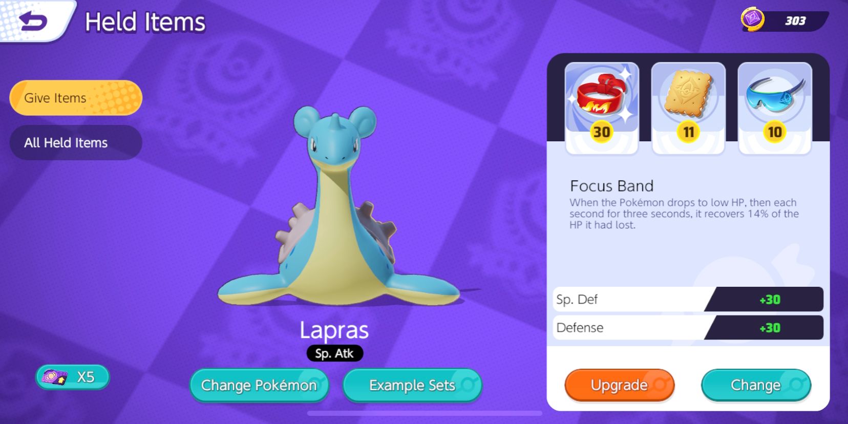 Lapras's Held Item selection screen, with Focus Band, Aeos Cookie, and Sp. Attack Specs chosen in Pokemon Unite.