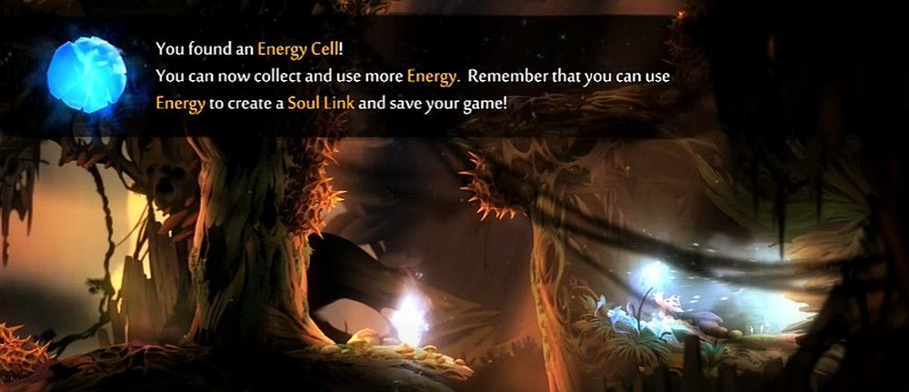 ori grabbing an energy cell in ori and the hollow forest