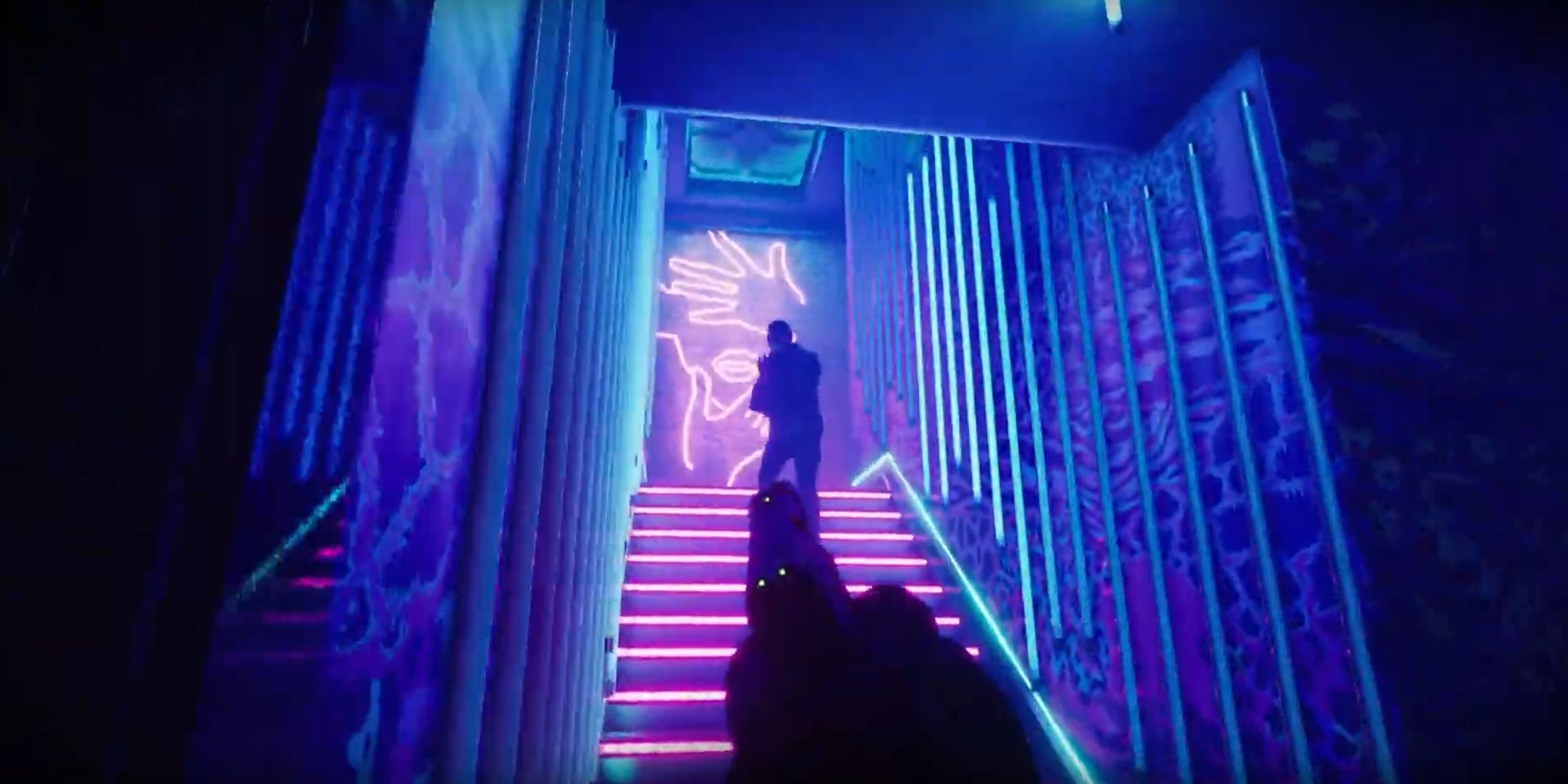 The player aims a pistol at a dark figure in a neon-lit set of stairs in Ready or Not