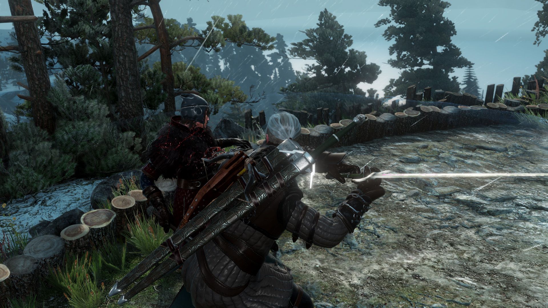 Geralt swings his sword two-handed, drawing blood from a female warrior in an arena.