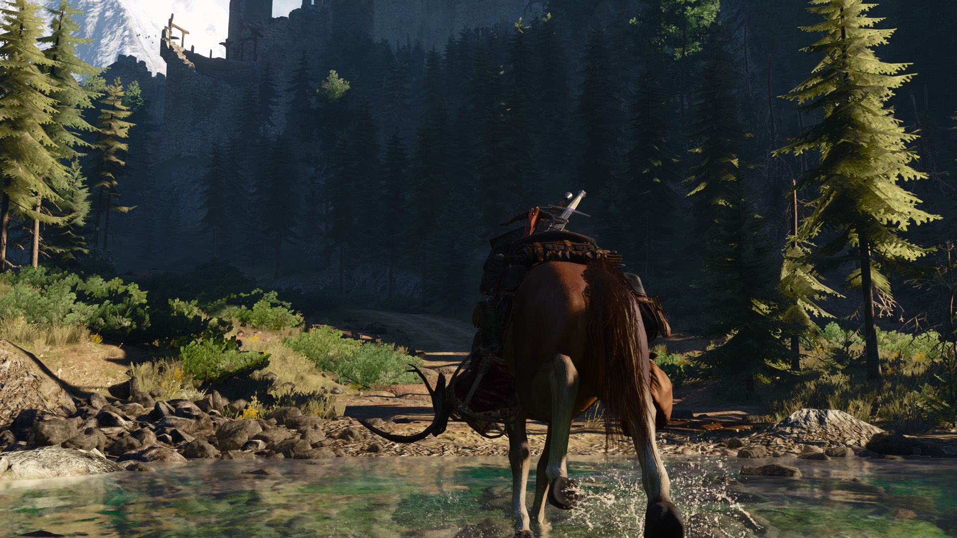 Geralt rides Roach through Kaer Morhen's valley during a beautiful morning with the rising sun lighting half the scene.