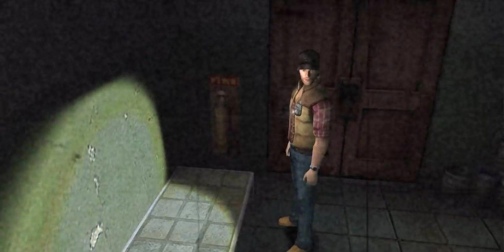 Travis Grady standing by a door in Silent Hill Origins 