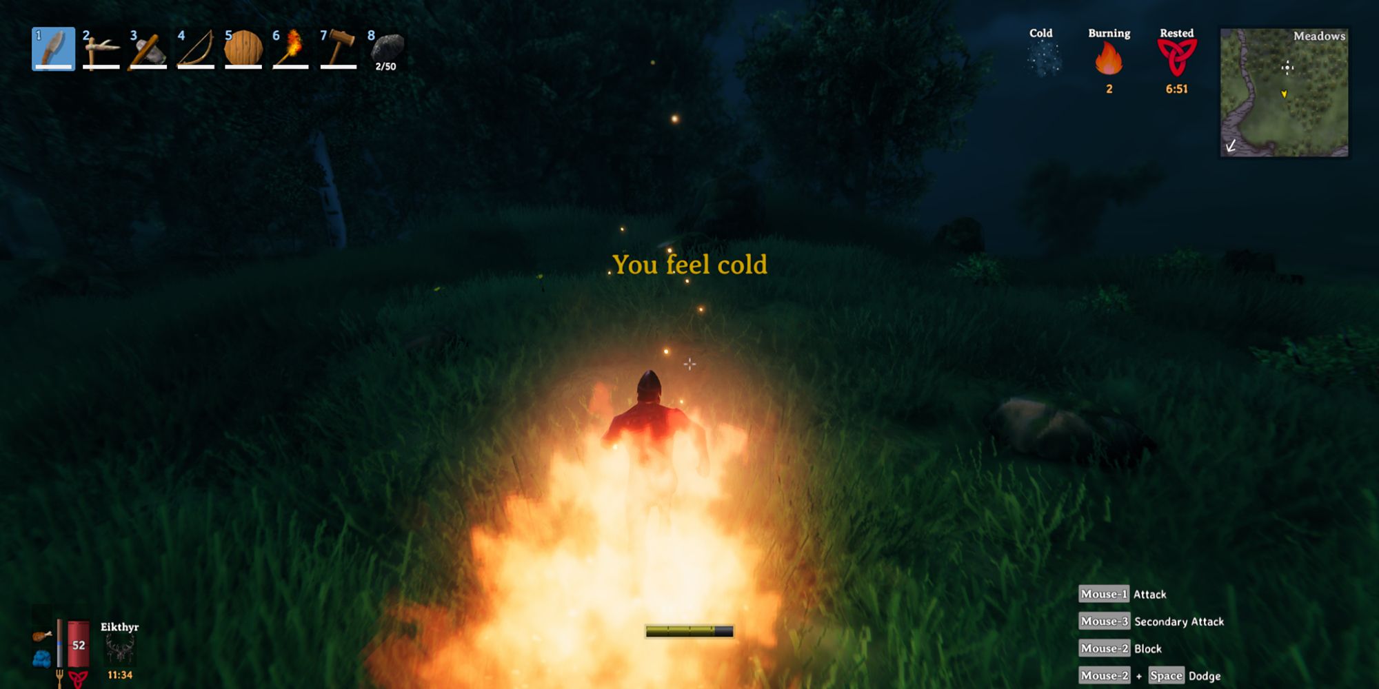 valheim player burning while message appears saying that you feel cold