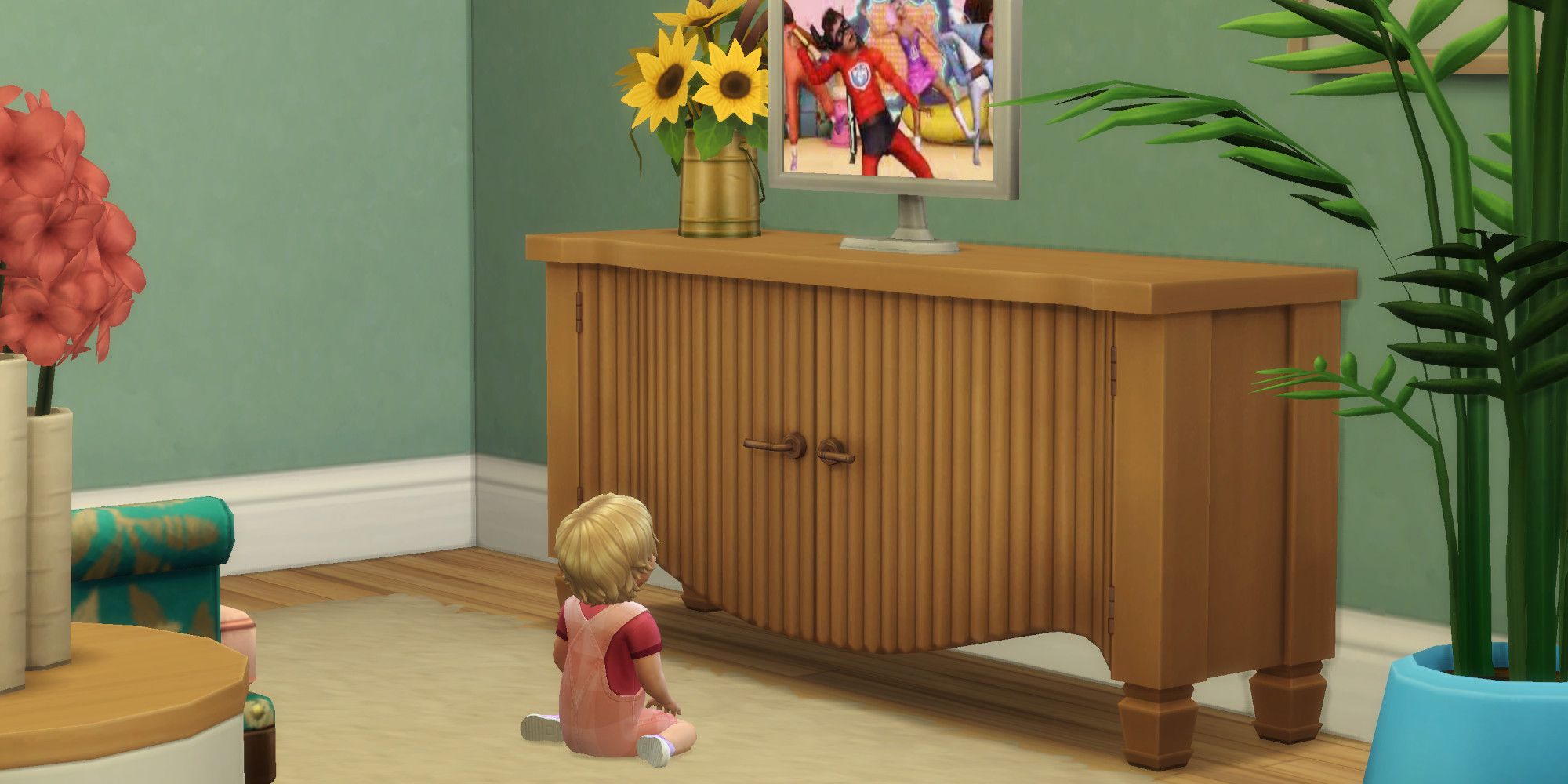 A sim infant sits and watches TV.