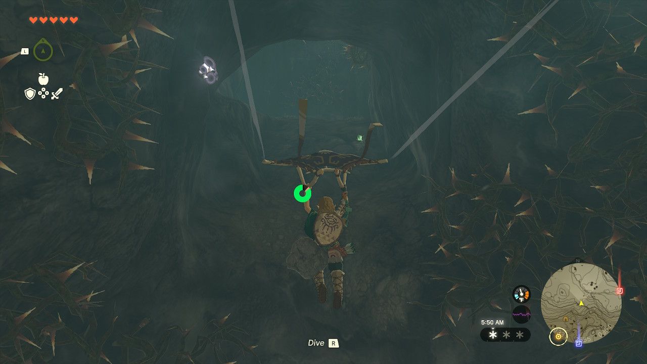 Link Glides Over To A Cave Entrance Surrounded By Thorns In Tears Of The Kingdom
