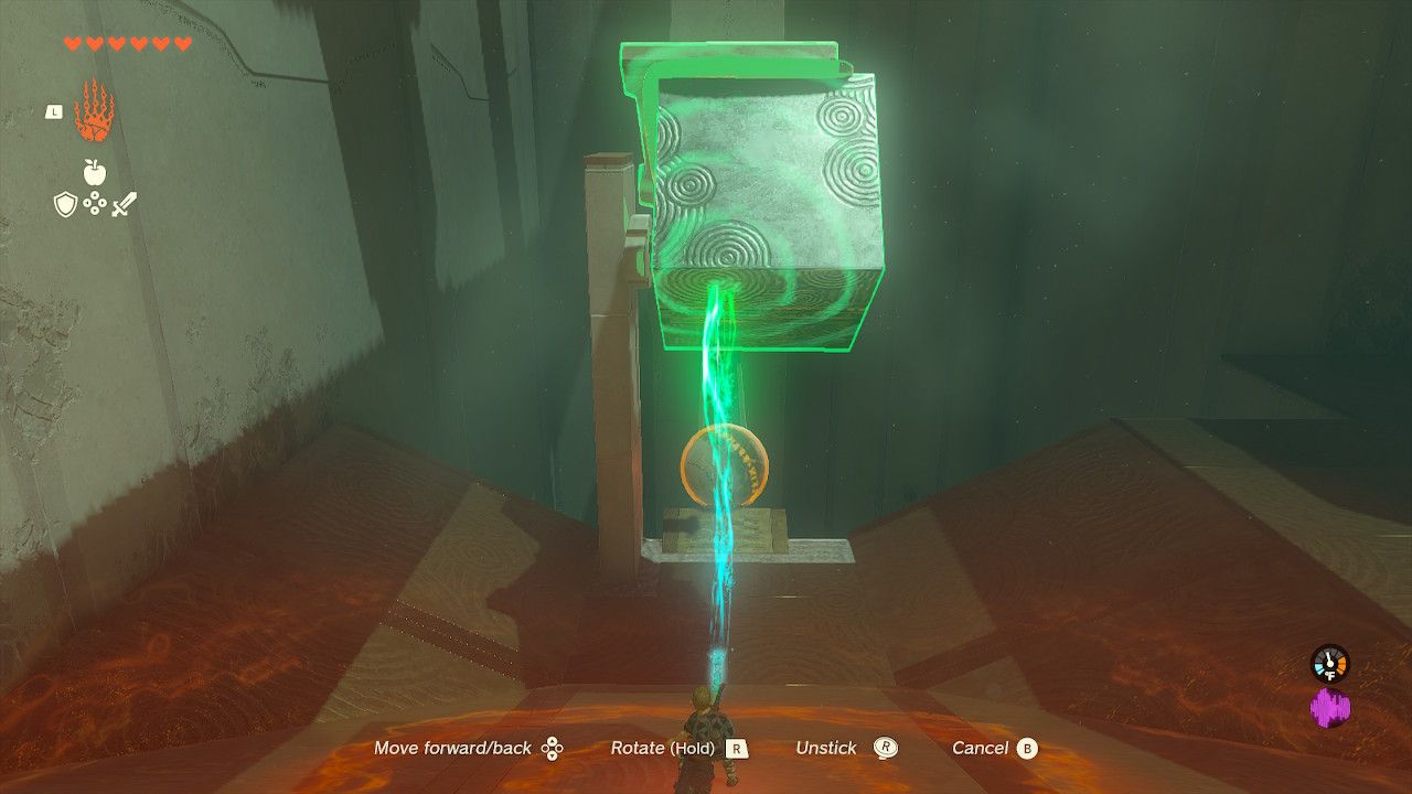 Link Lifts Metal Box To Slam An Orange Ball To Switch in The Legend of Zelda Tears of the Kingdom.