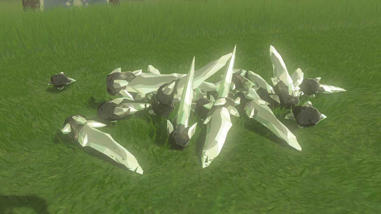 Link Takes Picture Of A Pile Of Over Twenty Diamonds In The Grass
