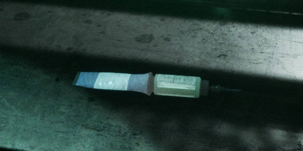 adrenaline shot item on metal counter in the outlast trials