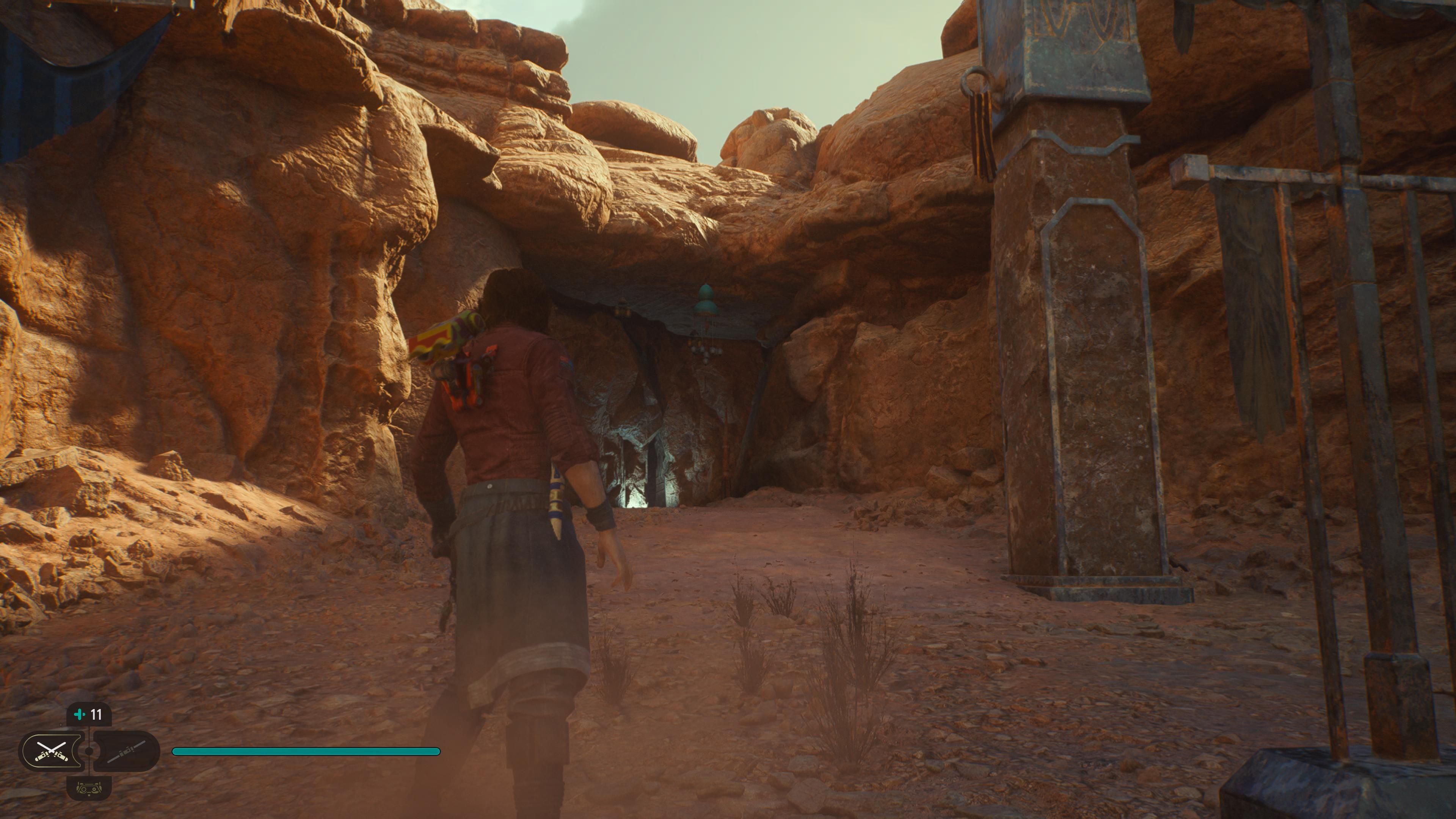 Cal facing a gap in a rock wall in Jedi Survivor