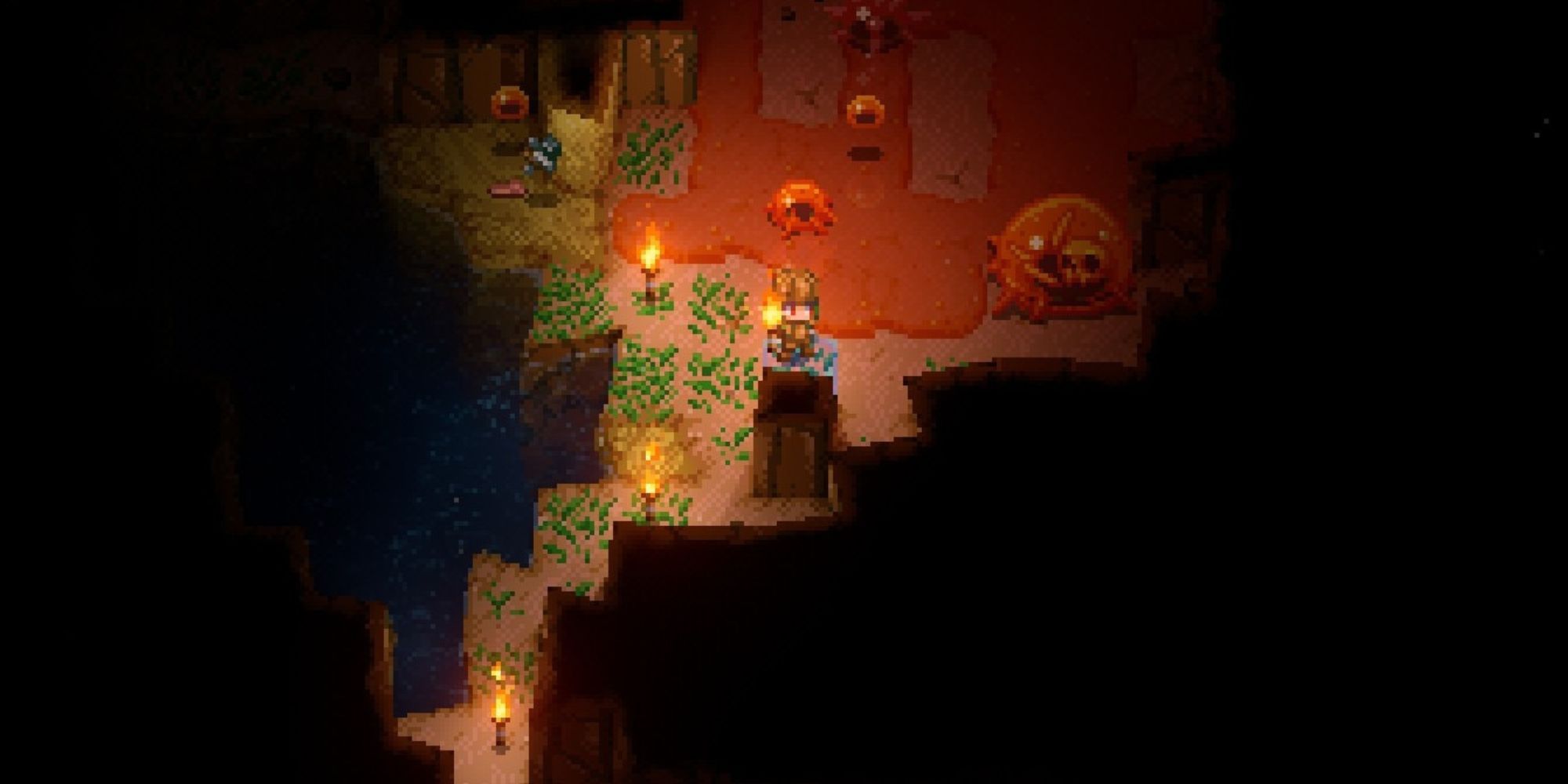 A player discovers orange slimes in a new dimly lit cavern.