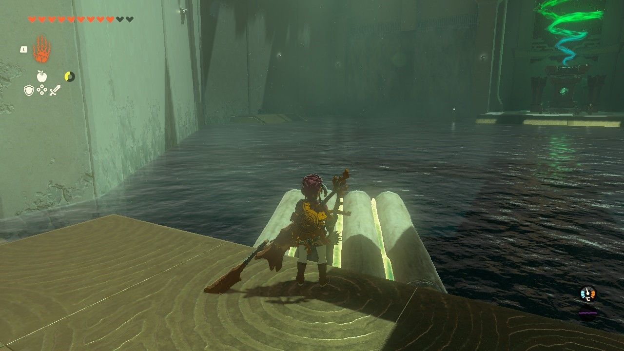 Link in front of a raft aiming to the left in The Legend of Zelda Tears of the Kingdom