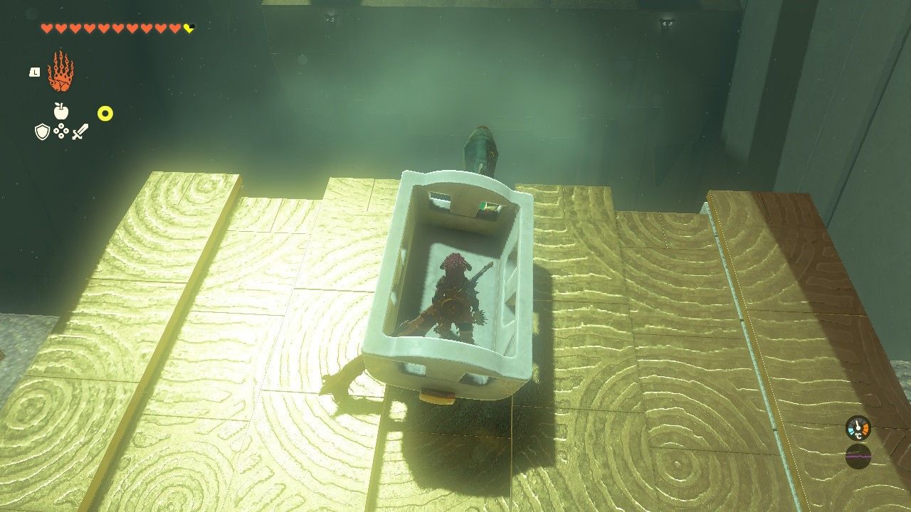 Link inside a minecart with a Zonai rocket attached to the front in The Legend of Zelda Tears of the Kingdom