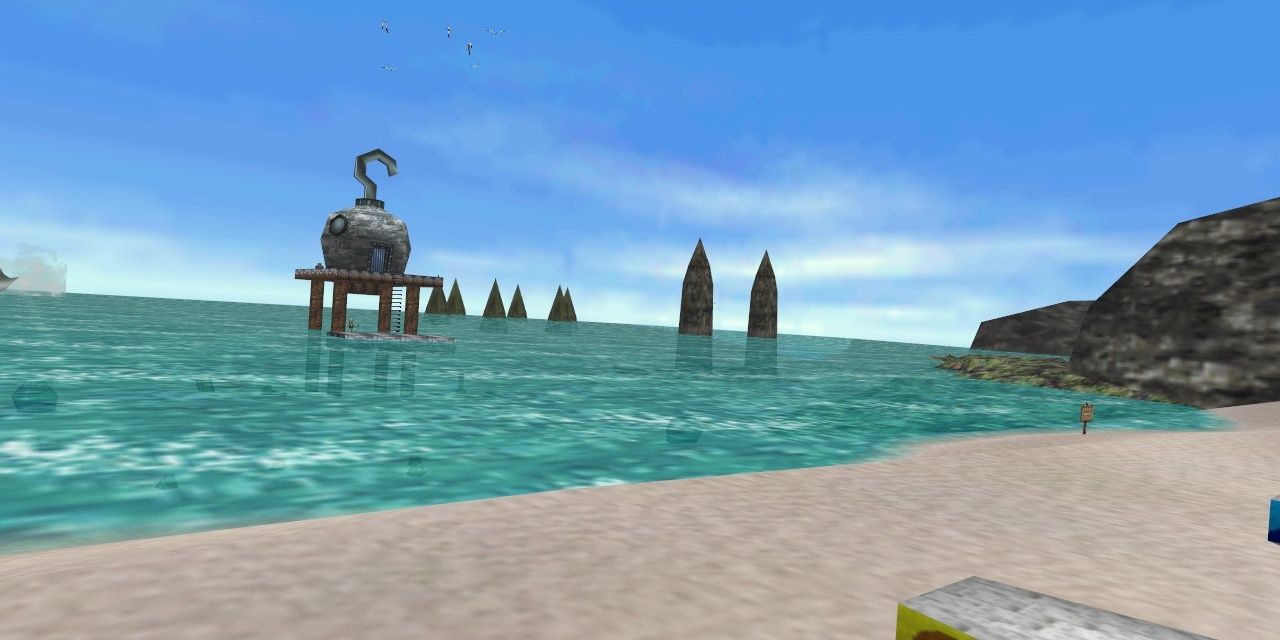 Majora's Mask Great Bay Coast area depicting a beach and a circular building out on stilts in the water