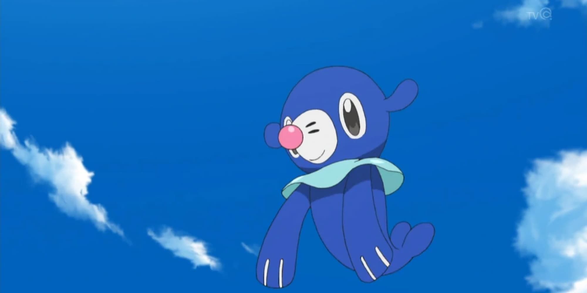 Popplio smiles as it leaps into the air in Pokemon.