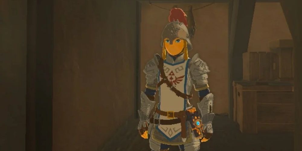Link standing idly in soldier armor in The Legend of Zelda: Breath of the Wild the video game