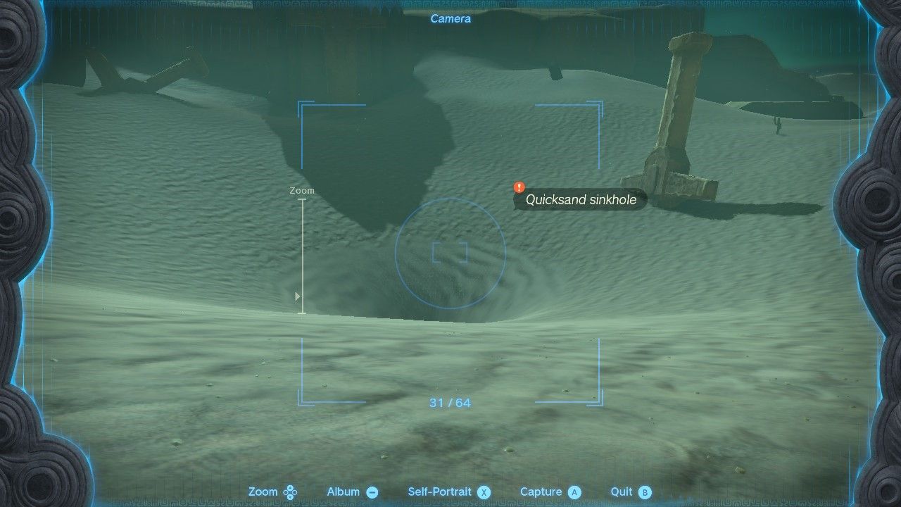 Taking a picture of the quicksand sinkhole in The Legend of Zelda Tears of the Kingdom