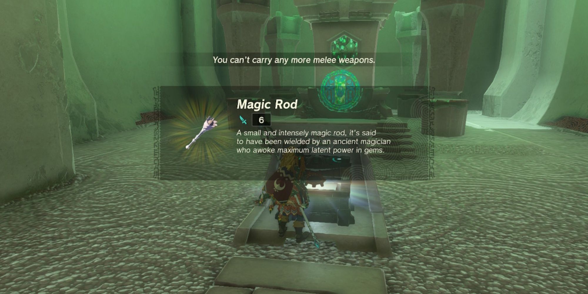 Link opening the Treasure Chest in the Rasitakiwak Shrine and acquiring a Magic Rod in The Legend of Zelda: Tears of the Kingdom