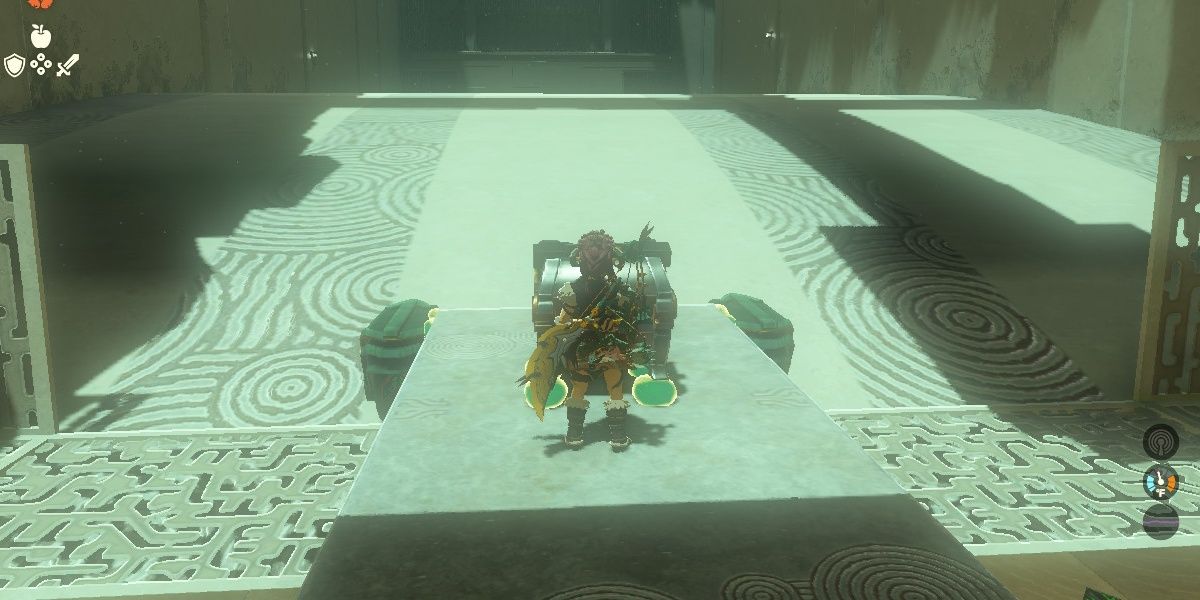 Link prepares to ride a car in the Susuyai Shrine.