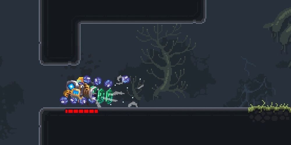 A fully upgraded Resource Vacuum Cleaner at full capacity, still sucking in some blue orbs