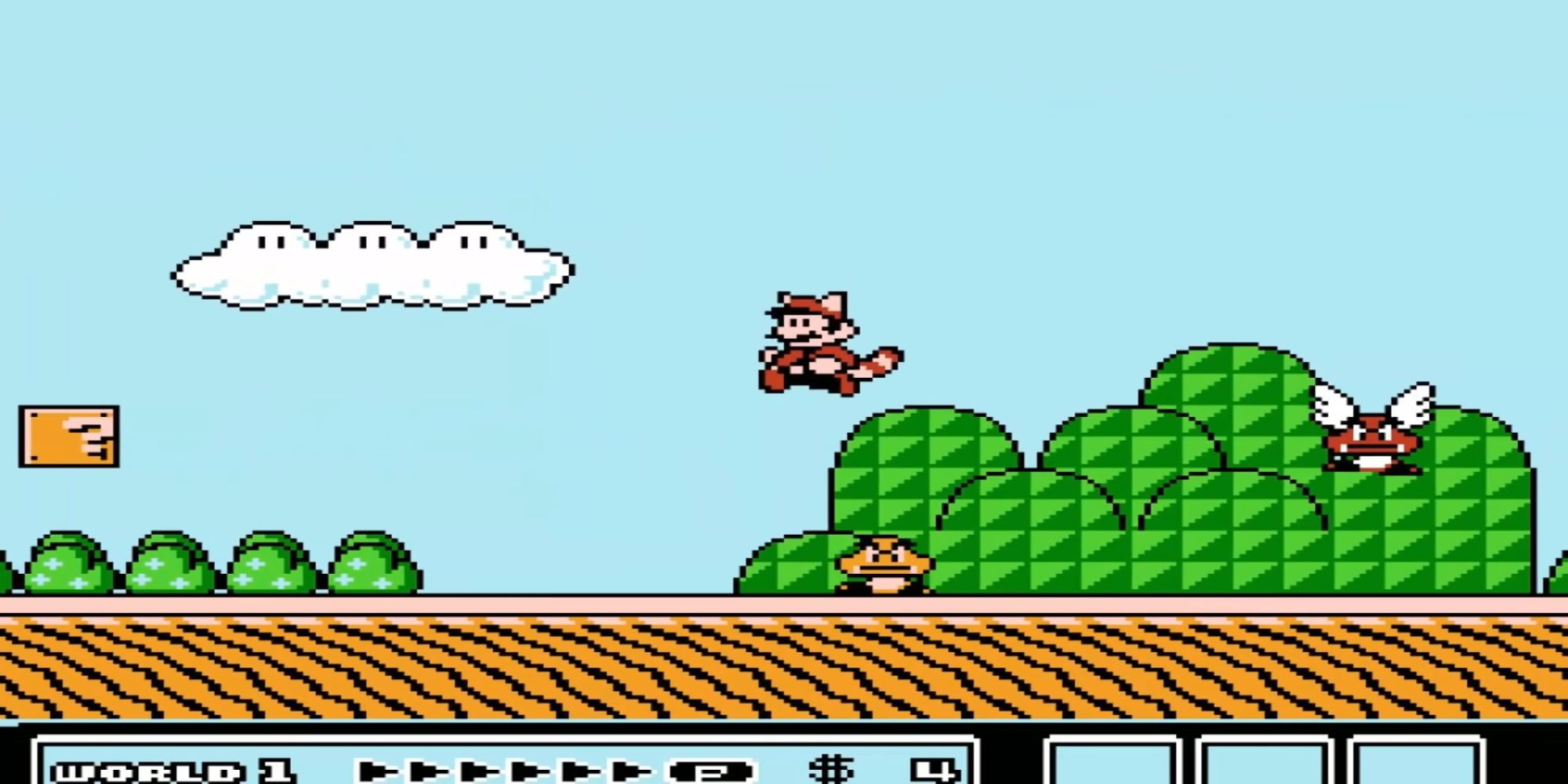 Raccoon Mario jumps over a Goomba as a Paragaloomba approahces in World 1 