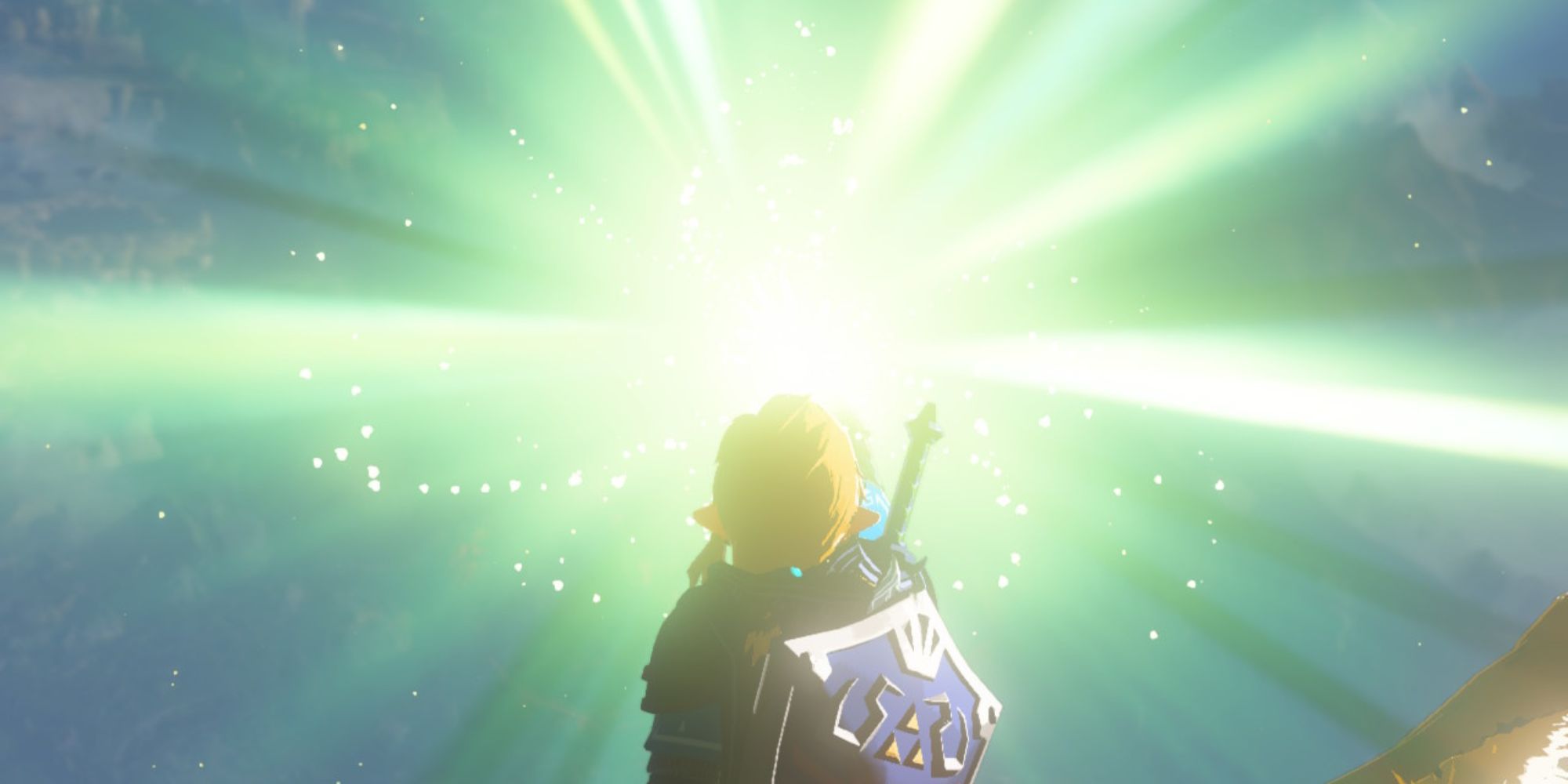 Zelda: Tears of the Kingdom - Link holding up his glowing hand