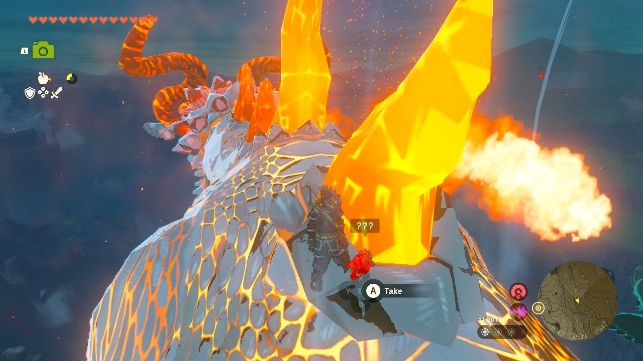 Link Picks Up Spine Shard From Dinraal's Back