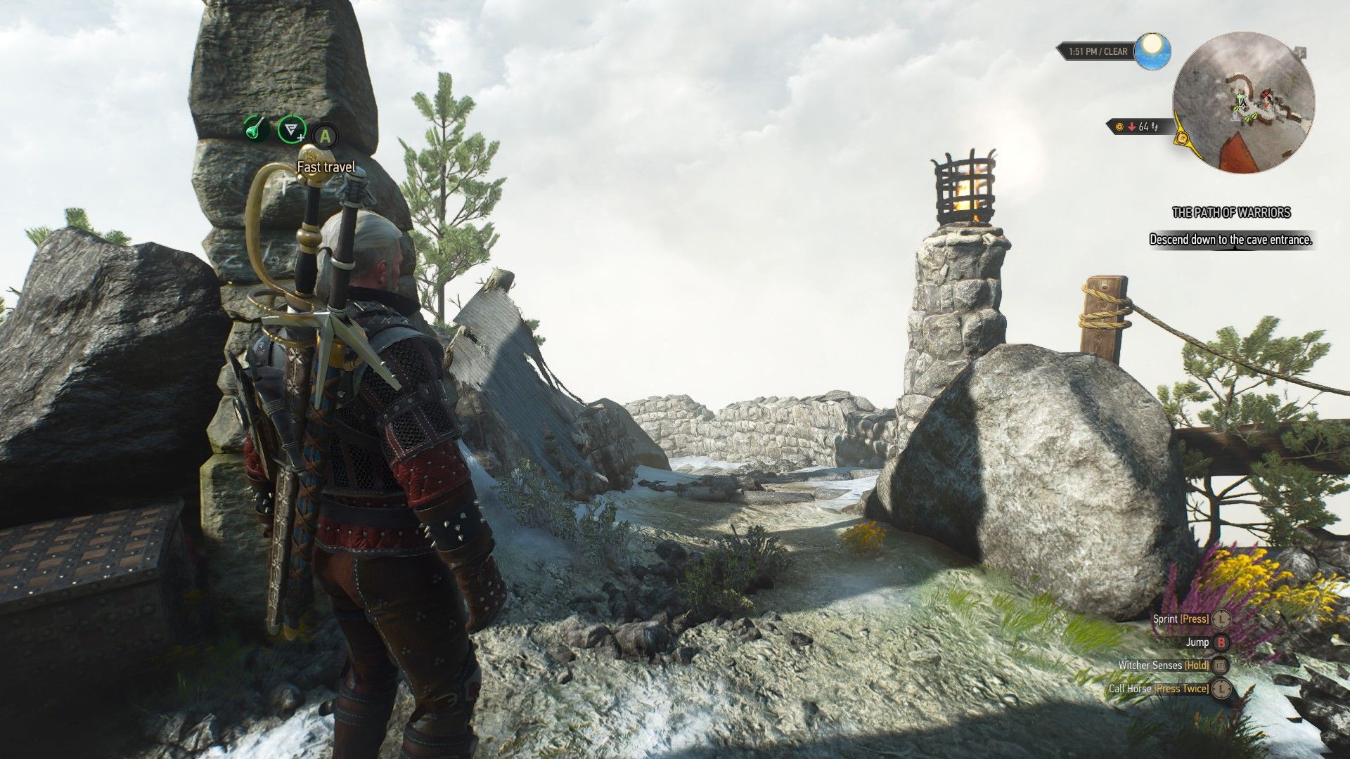 A screenshot of Geralt facing the exit to the summit reached during The Path of Warriors.