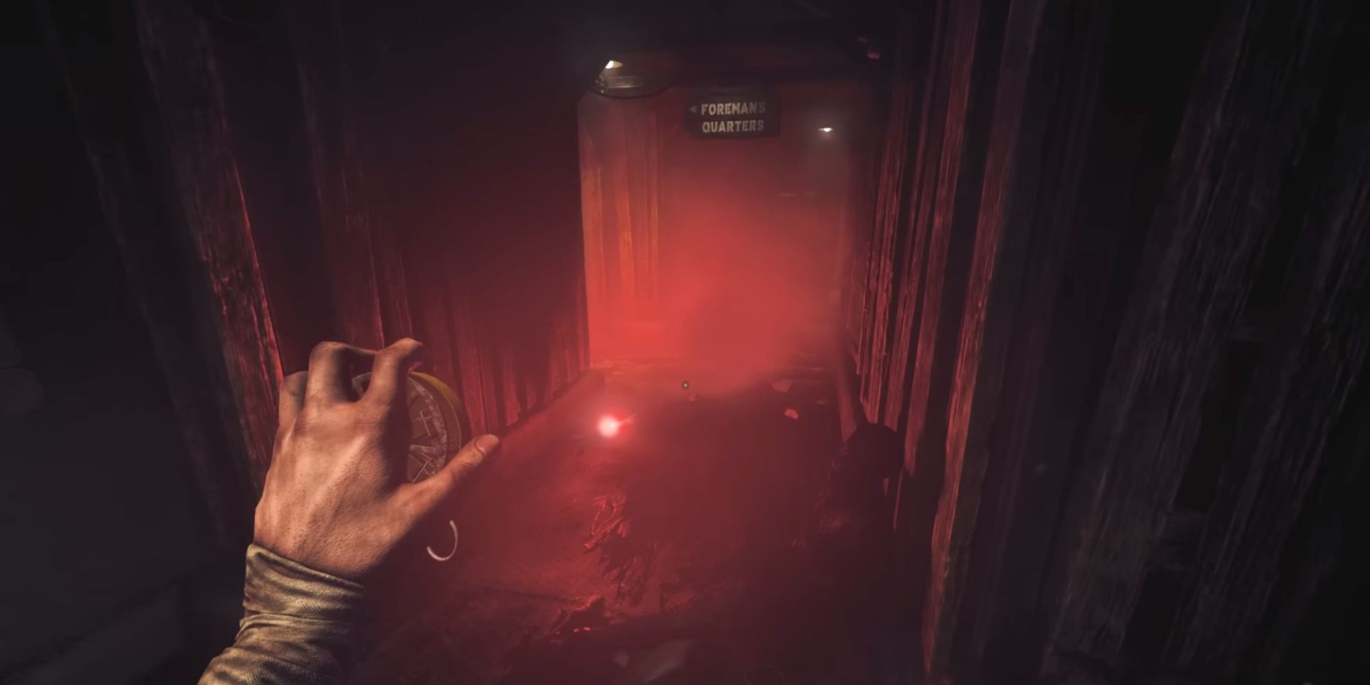 Character throwing flare on the floor in Amnesia: The Bunker