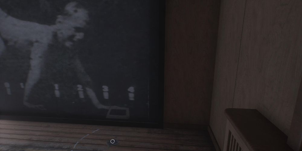 a projector slide on the ground next to a frame from an Edweard Muybridge movement study depicting a crawling child in layers of fear 2023
