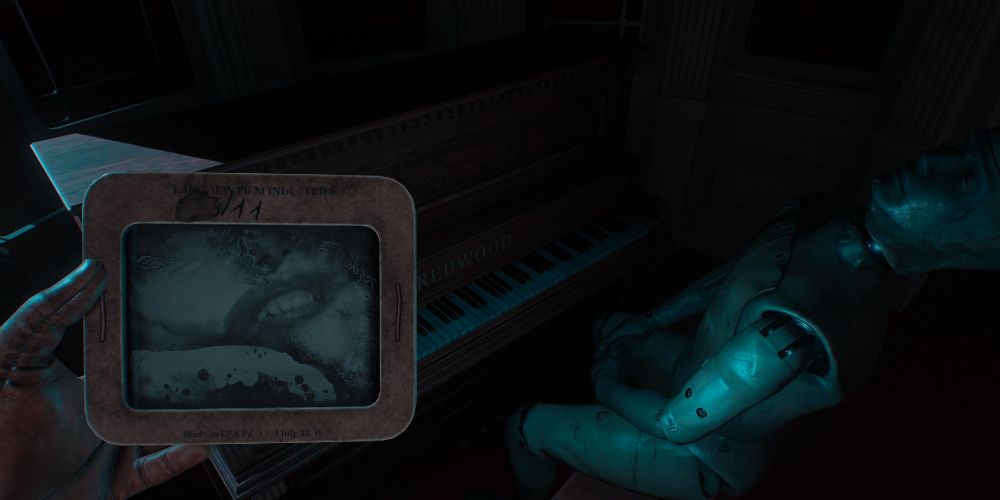 the actor takes a projector slide from a mannequin seated at a piano in layers of fear 2023