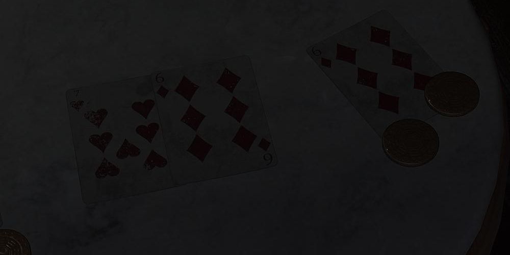 playing cards on a dimly-lit table in layers of fear 2023