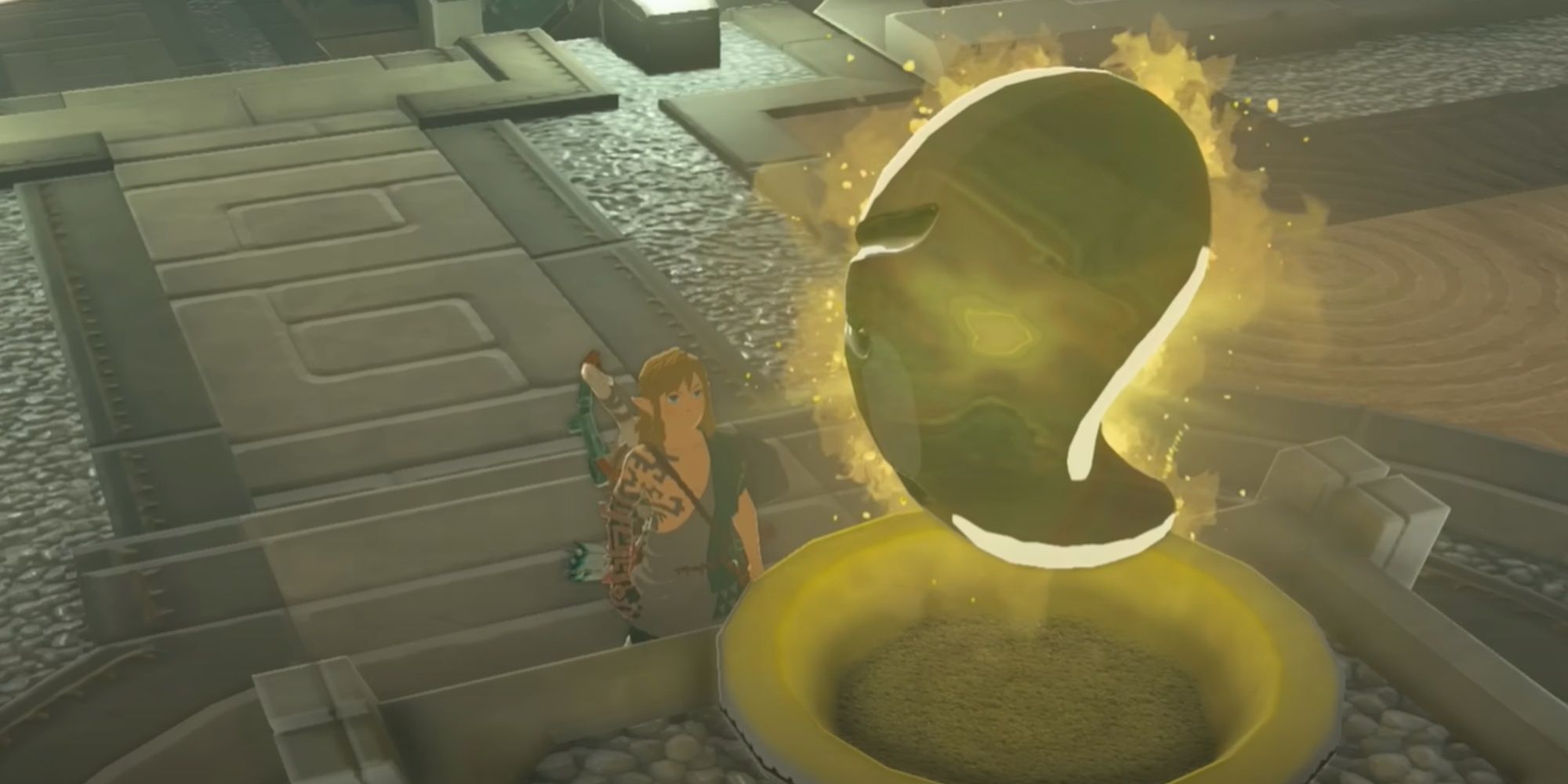 Link standing in front of a giant Secret Stone in Tears of the Kingdom