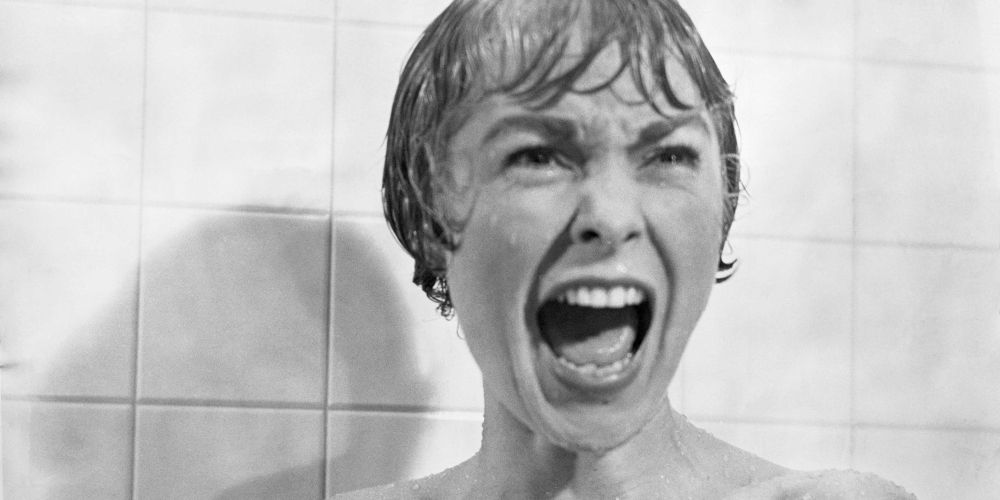 Marion (Janet Leigh) screams as she is attacked in the shower in Alfred Hitchcock's Psycho (1960)