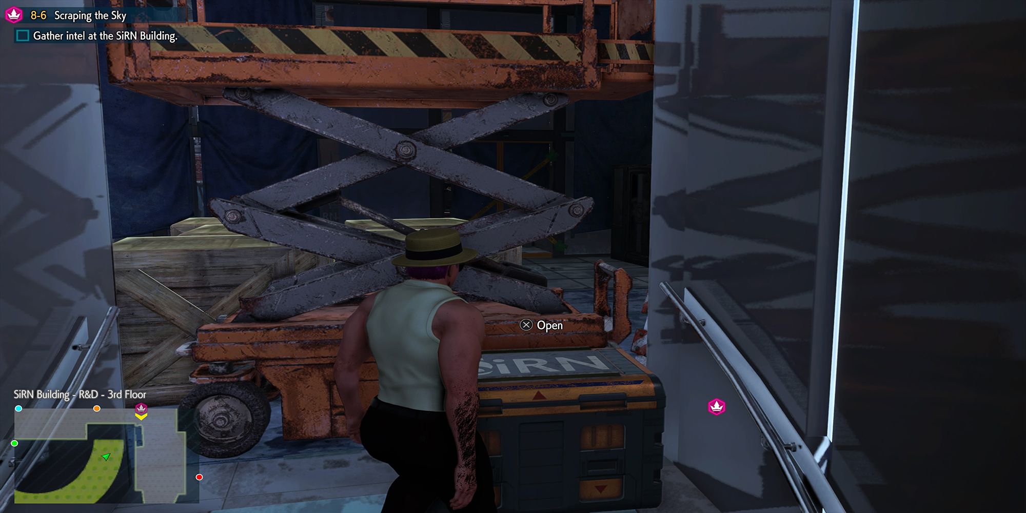 The player avatar approaches a SiRN Chest behind a scissor lift inside the SiRN Offices in Street Fighter 6.