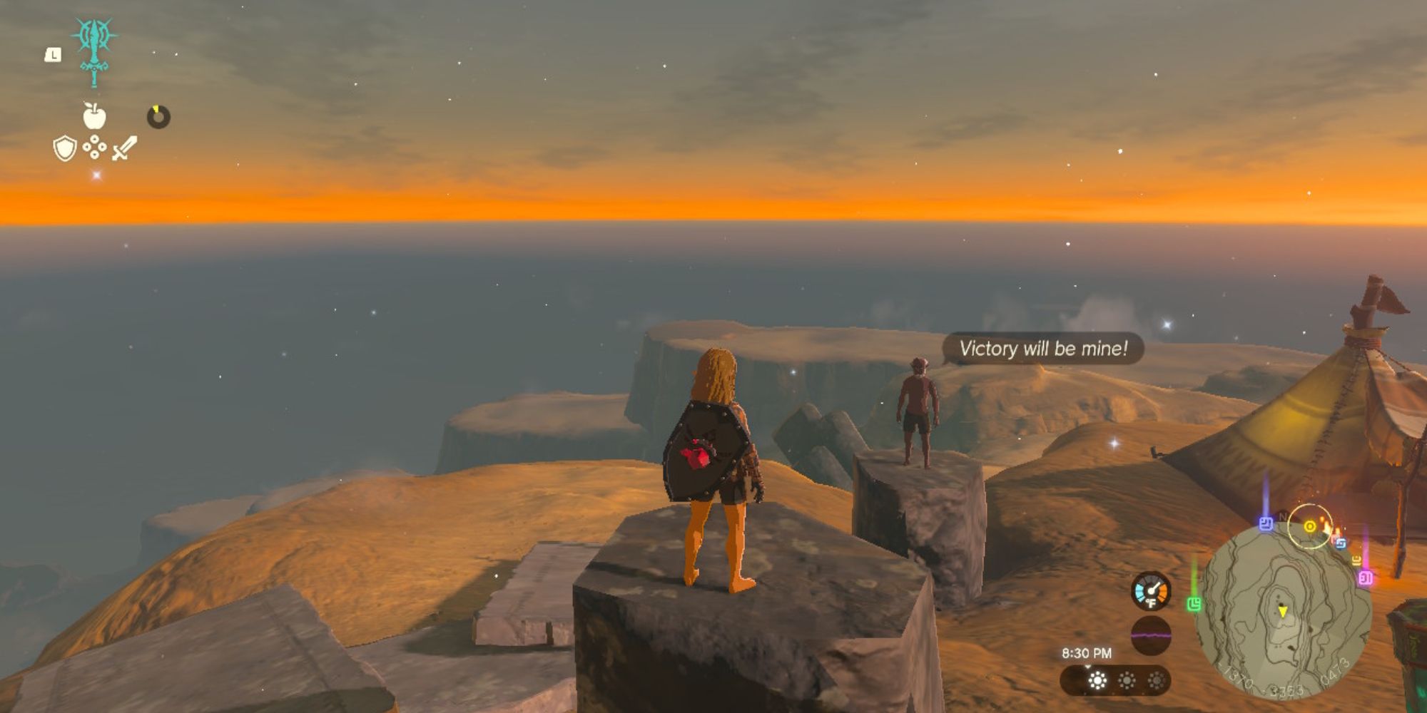 Link stands on a stone pillar as night falls.