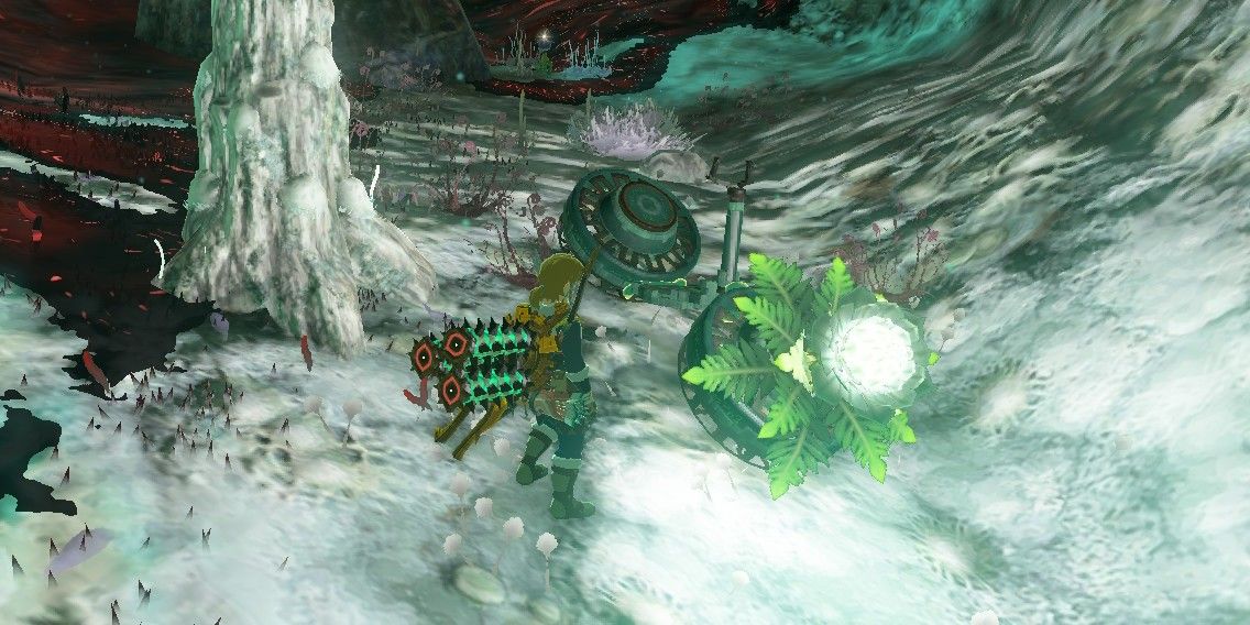  Tears of the Kingdom screenshot of Link in the Depths, next to a hoverbike with a Large Brightbloom seed attached