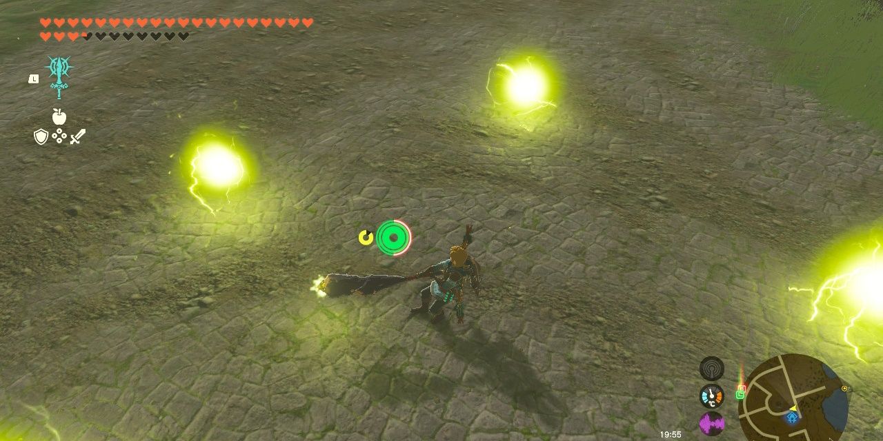 Tears Of The Kingdom topaz on a gnarled big stick firing off electric orbs while doing a spinning attack