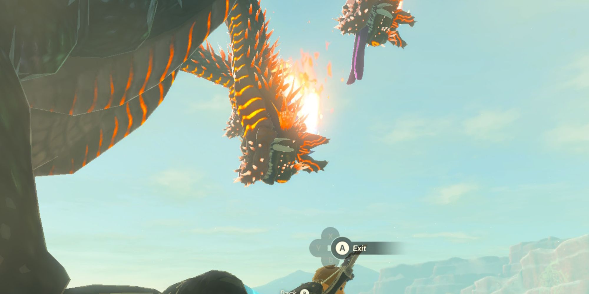 the legend of zelda tears of the kingdom link partially ascended through the floor while a fire gleeok looks down toward him