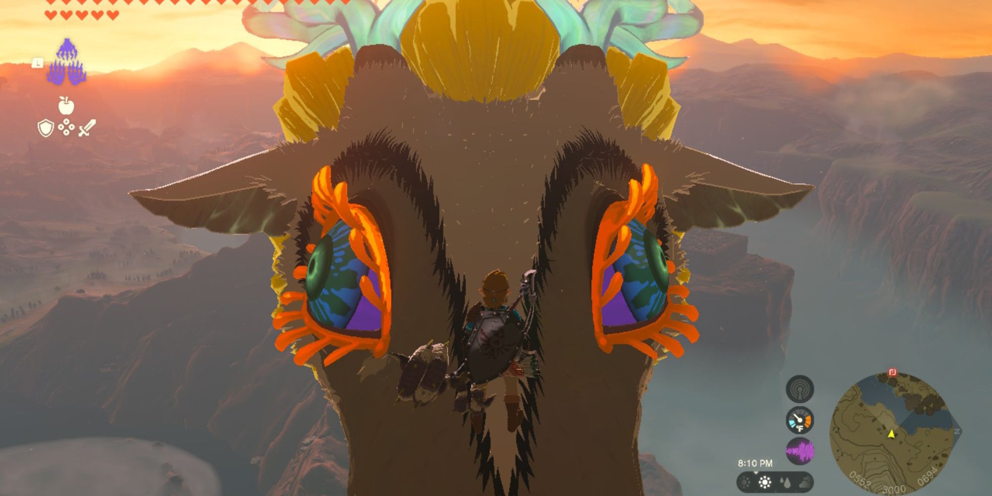 the legend of zelda tears of the kingdom link riding on top of the light dragon's head
