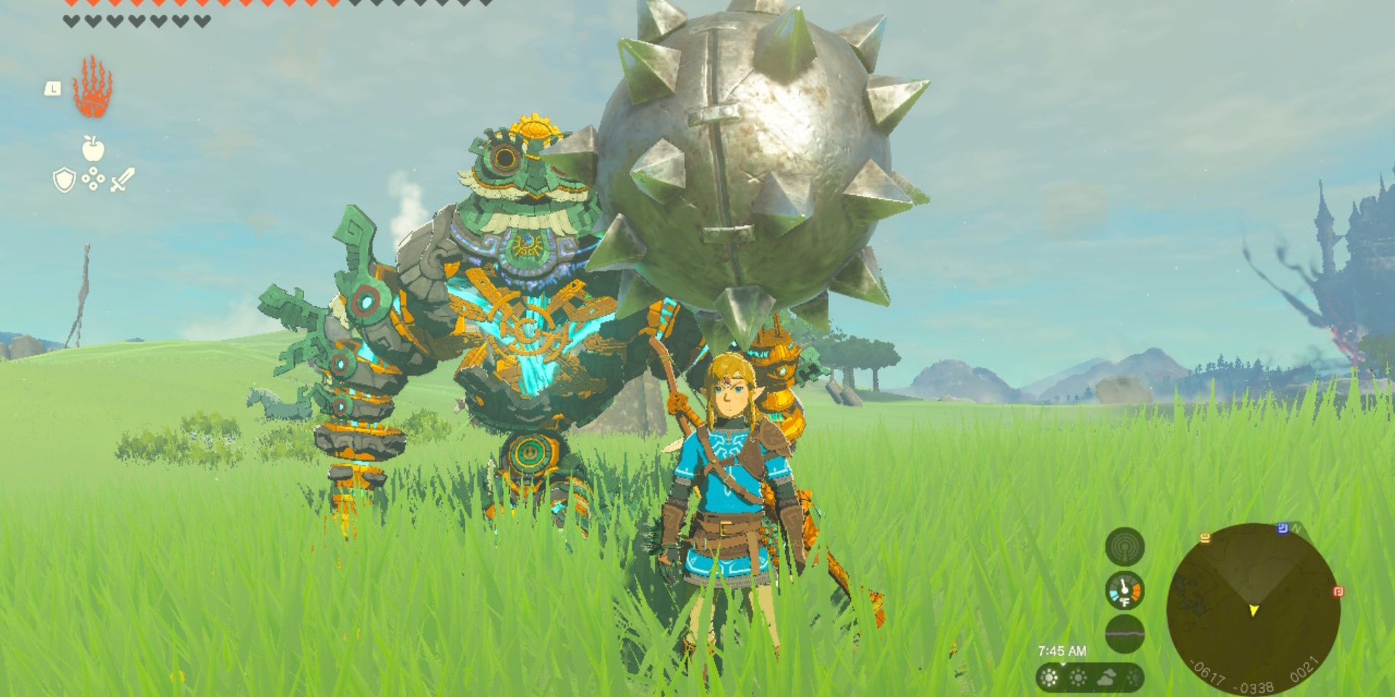 the legend of zelda tears of the kingdom mineru's construct attached to a giant spiked ball while link stands in front