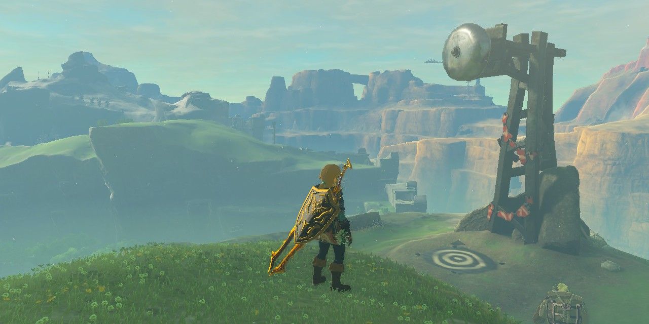 Zelda Tears of the Kingdom screenshot of Link standing next to the bell ringing minigame