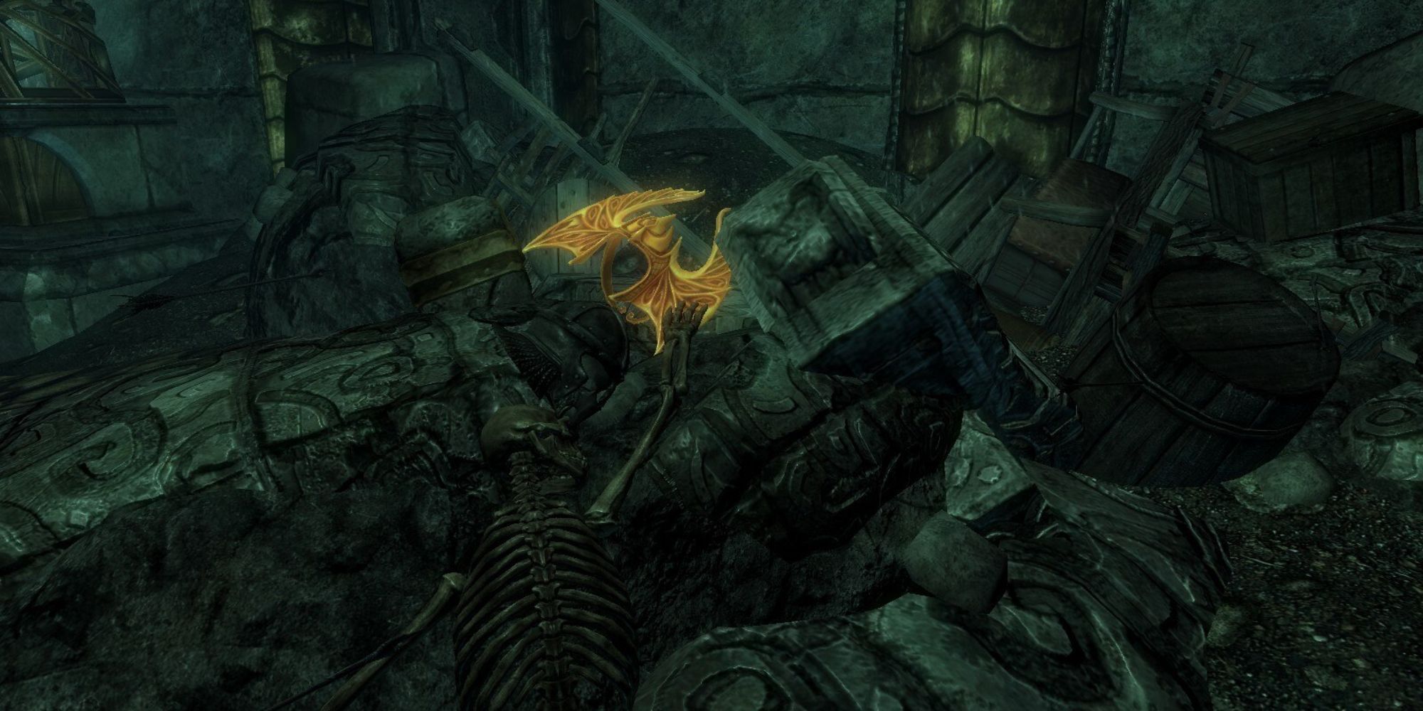 The golden and glowing Crown of Barenziah resting in rubble in Skyrim.