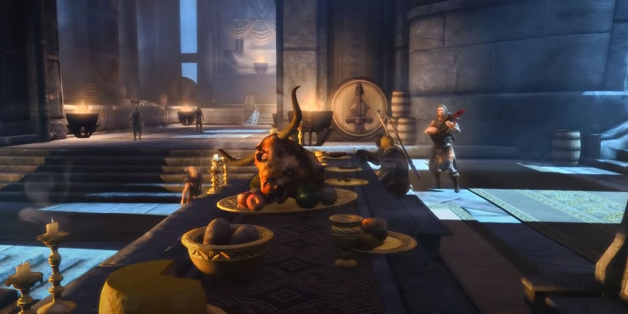 A Roasted Ox Head laying atop a plate with fruit on a long table in Skyrim.