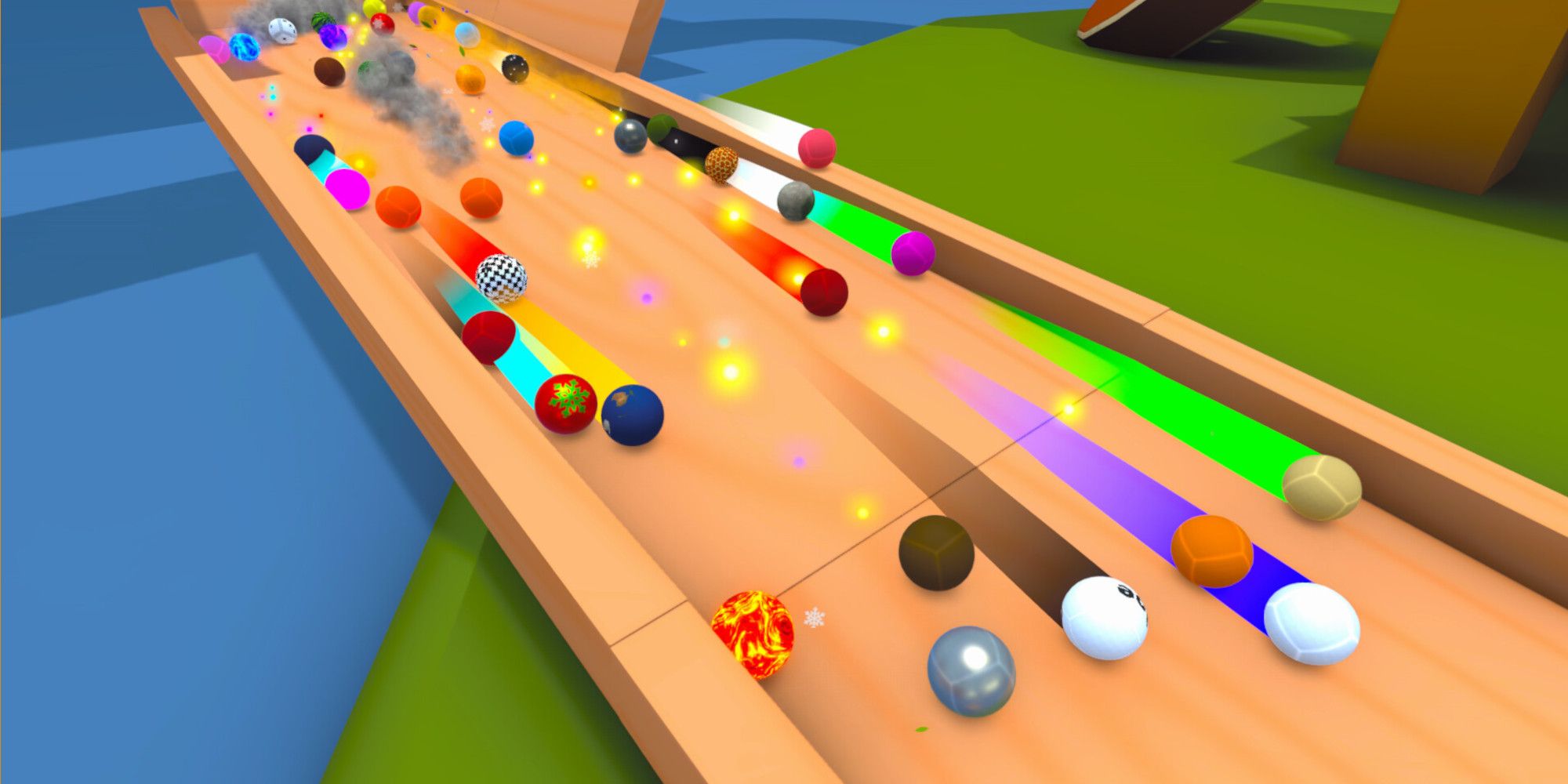 An image from Marble World showing many marbles sliding down a track