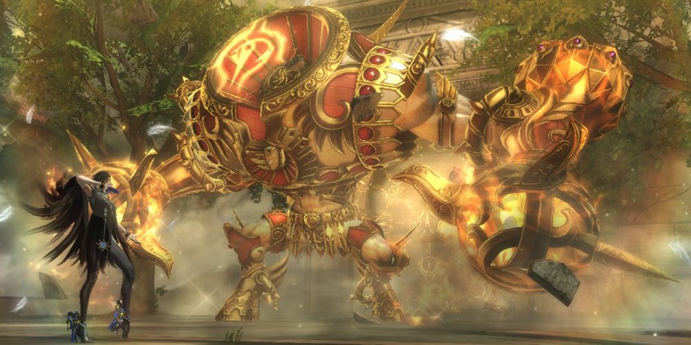 Bayontta Fighting a Golden Giant Flaming Boss