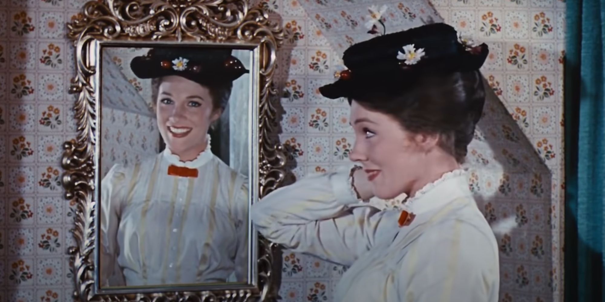 Mary Poppins looking into the mirror at her reflection