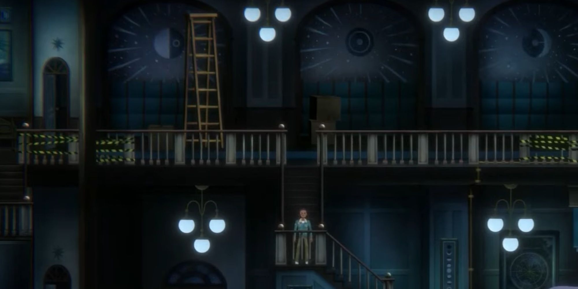 Charlie standing on a staircase inside the Community Center with blue lighting.