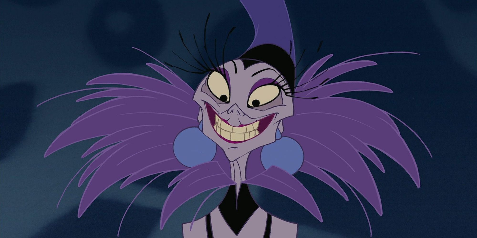The villain Yzma from The Emperor's New Groove wearing a purple feather outfit and blue earrings, and a wide smile on her face.