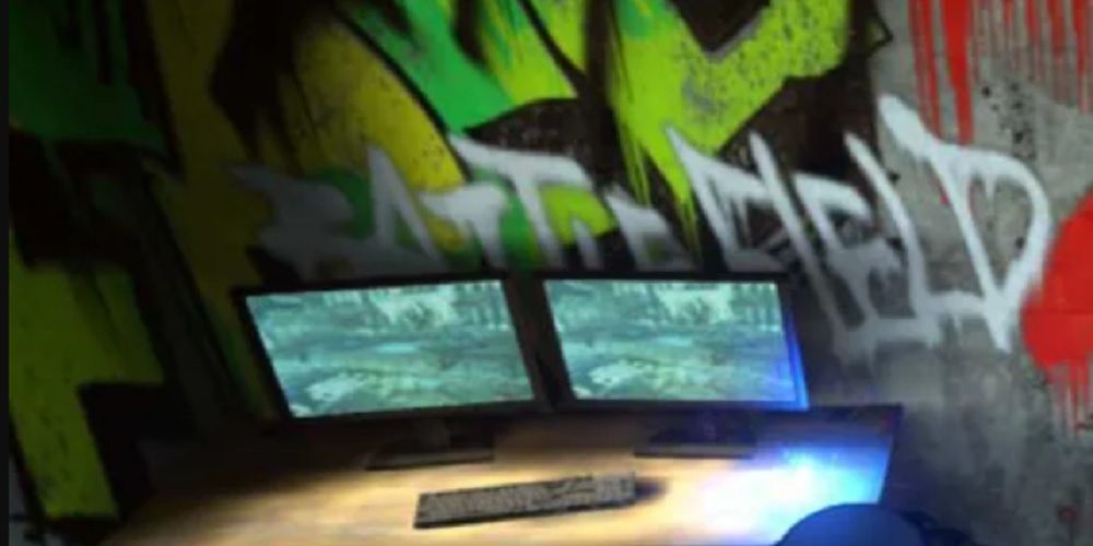 The Resistance's monitor screens and keyboard at their hideout in Rain Code